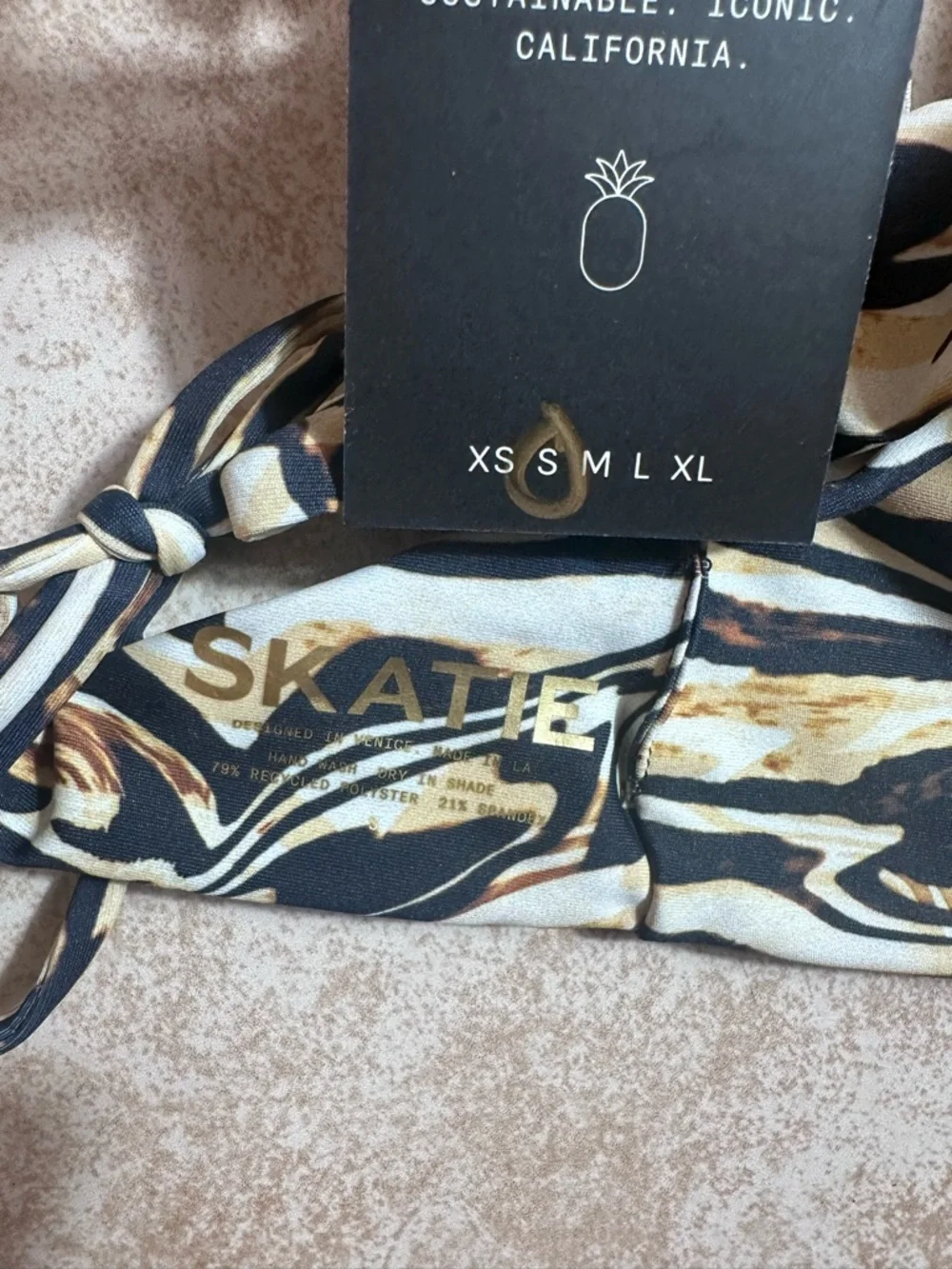 Skatie Swirl-Print Bikini Top in Black, Cream, and Brown